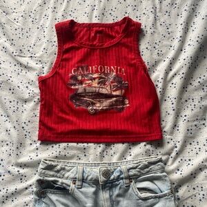 Women’s red cropped tank. In great condition.